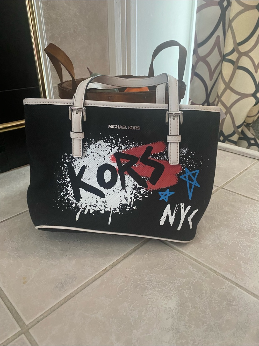 Michael Kors Black Tote with White Trim and Red & Blue Graphic